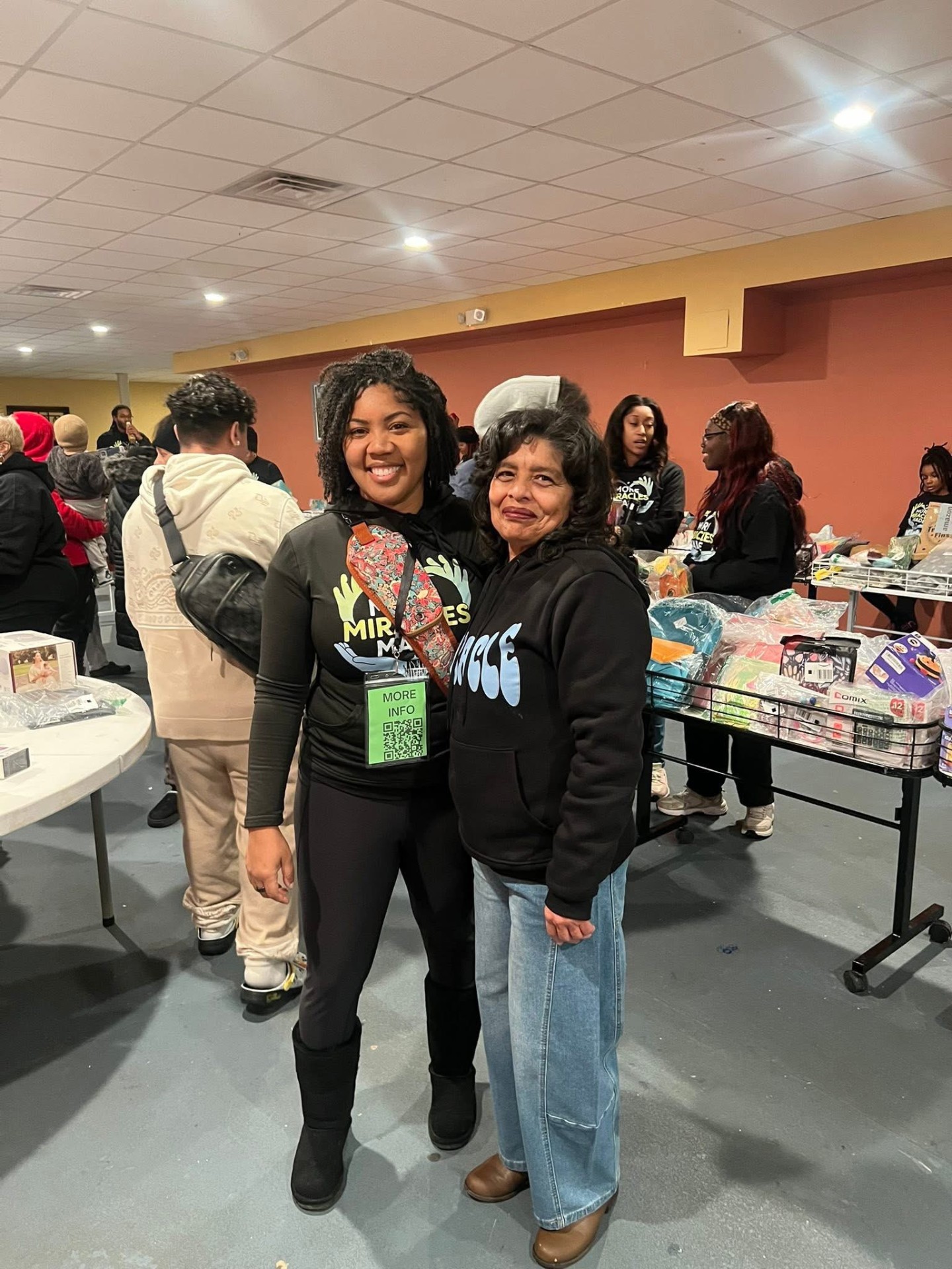 Community members connecting at a Village resource event